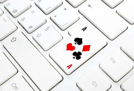 Poker or Casino online game concept. Key on white keyboard